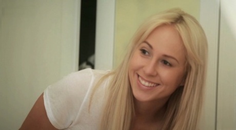 Blonde girl Carla Cox and her man friend pause for a quickie on their bed 76042656