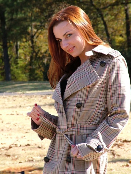Redhead amateur Amber Lily flashes in public while wearing nylons and garters 82305228