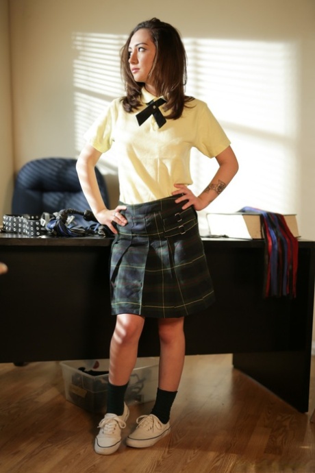 Young girl Lily Jorda takes off her uniform to get naked on an executive desk 26816919