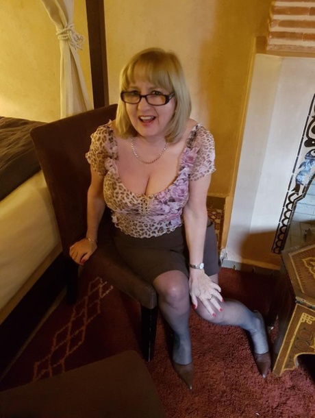 Older amateur Lorna Blu bares her big boobs and twat in assless pantyhose 74407192