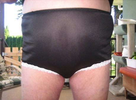Old lady Girdle Goddess shakes her big butt while on a veranda 95522497