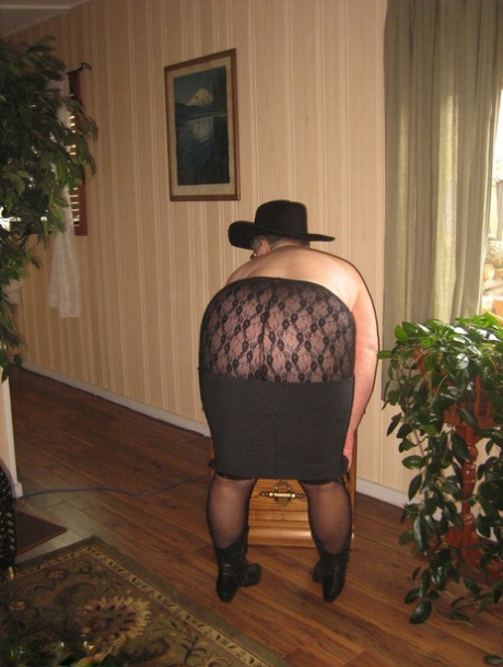 Fat oma Girdle Goddess strips naked in a cowgirl hat and boots 84068236