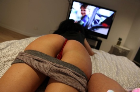 Brunette amateur Madisson Stewart watches TV in booty shorts before POV sex 87616751