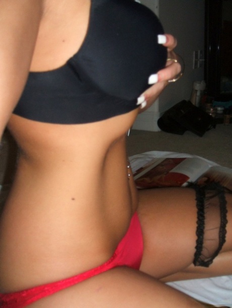 Blonde girl with striking eyes covers her naked body in chocolate sauce 74115629