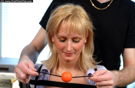 Busty blonde amateur is fitted with a ball gag for the first time 24630290