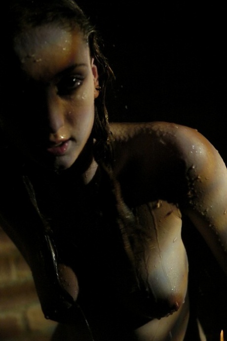 Sexy brunette Sissi cools off her hot body in poor lighting conditions 76201635