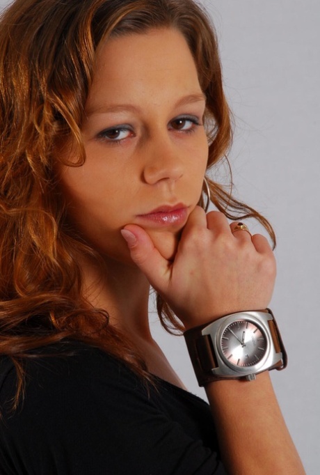 Natural redhead Sabine shows off her OOZOO cuff watch while fully clothed 30726500