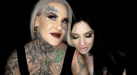 Tattooed lesbians Evilyn Ink & Misha Montana engage in strapon sex 29658410