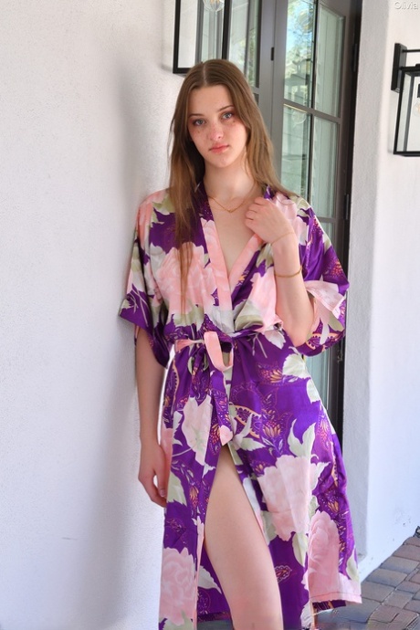 Slender beauty Olivia Madison masturbates with a dildo in front of a pool 18137328