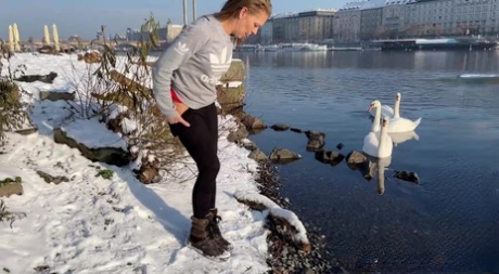 White girl Juliia pulls down her leggings to pee while swans look on 41487360