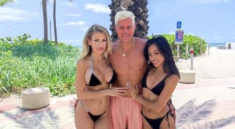 Bisexual girls Jade Kimiko & Gigi Dior kiss on a bed before threesome sex 31756774