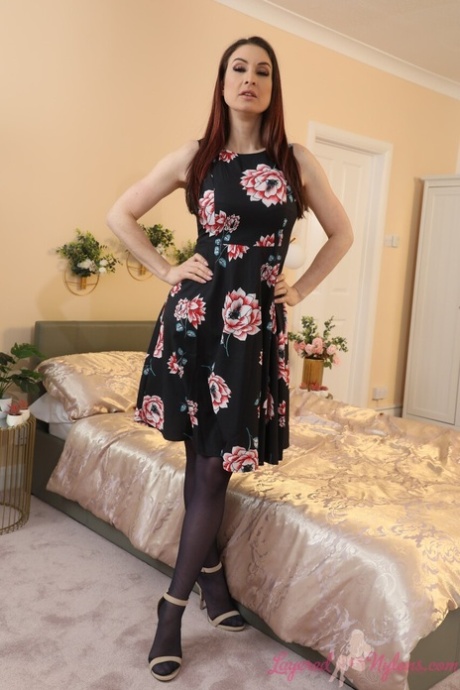 Beautiful girl Petra V uncovers her firm tits while wearing layered nylons 30865001