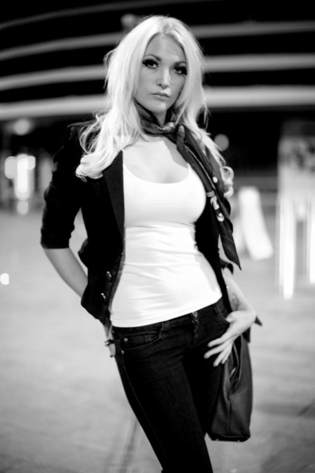 Platinum blonde models fully clothed during an outdoor shoot 32442541