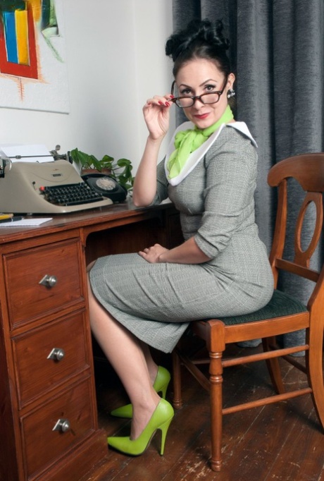 MILF secretary Sophie Delane in glasses stripping to spread naked at her desk 90240264