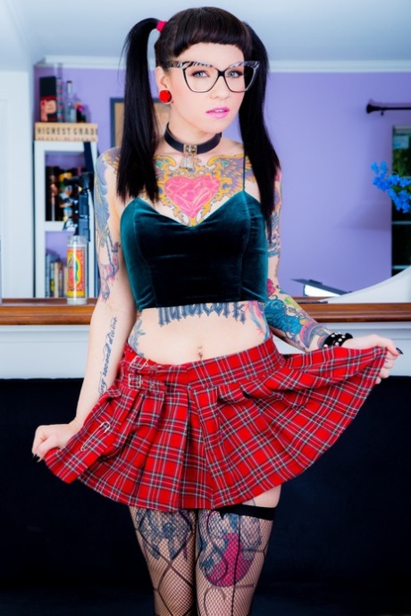 Tattooed Necro Nicki in pigtails & short skirt on knees showing tight ass 59528759