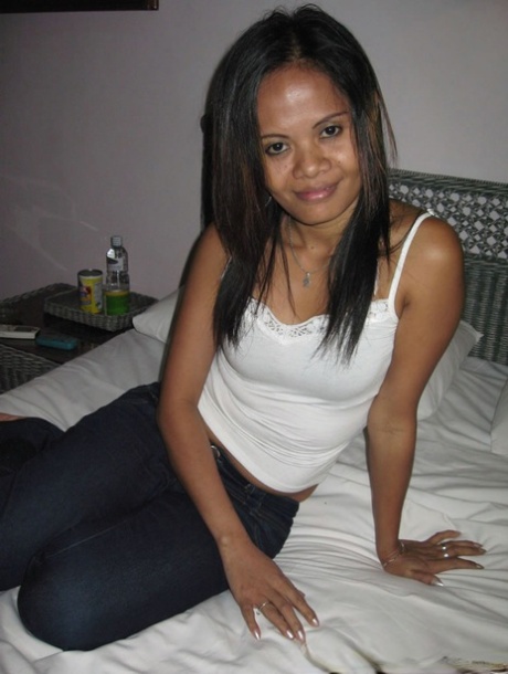 Tiny Filipina girl uncovers her tiny tits as she she strips to black underwear 41486376
