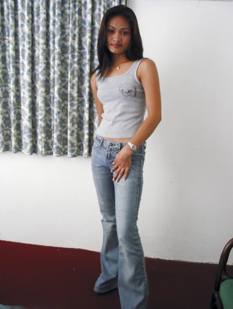 Asian slut Nuanne fingering pussy on bed and waiting for a miracle 90088611