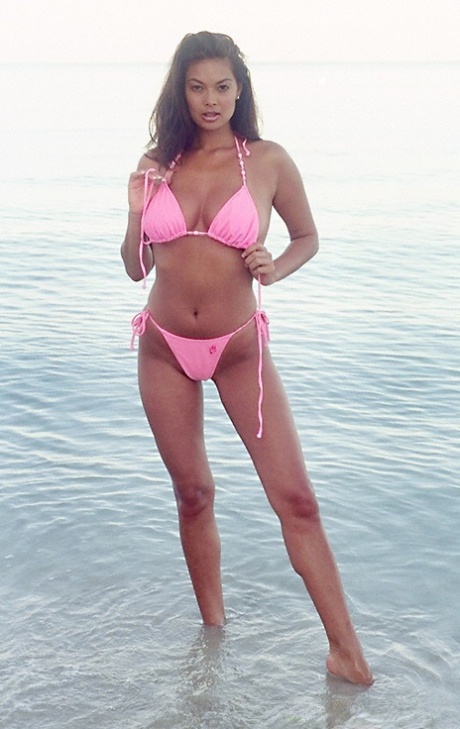 Steaming hot brunette with perfect tits stripping off her bikini outdoor 55114167