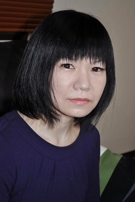 Asian gal Yoshie Tabata strips down and enjoys pussy toying and fingering 94455740