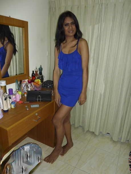 Gorgeous brunette Asian ladyboy Chocolate bending over in her skirt 40731801