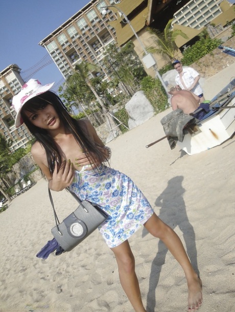 Cute skinny Asian tranny Mon posing outdoors and showing her cock 69252142
